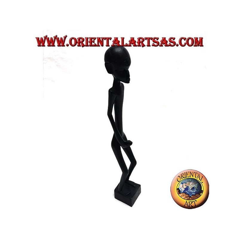 Escultura de un hombre que se masturba de pie en madera de ébano.