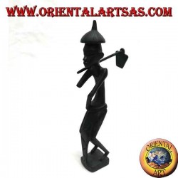 Sculpture of a farmer holding a hoe on the shoulder and a pointed ebony hat