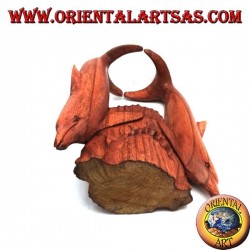 Bottle holder with sculpture of two dolphins in Suar wood acrobatics