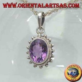 Silver pendant with faceted oval natural amethyst surrounded by intertwining and balls