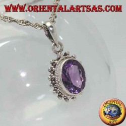 Silver pendant with faceted oval natural amethyst surrounded by intertwining and balls