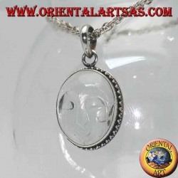 Pendentif en argent avec soleil évidé en cristal de roche et bordure ornée de points