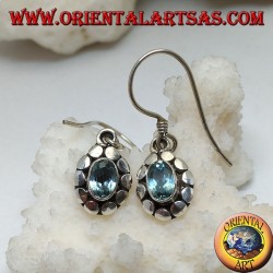 Silver earrings with natural oval blue topaz surrounded by discs