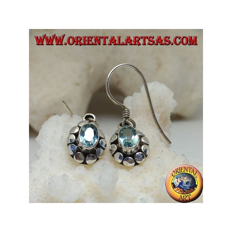 Silver earrings with natural oval blue topaz surrounded by discs