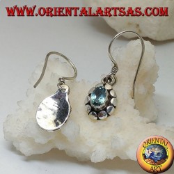 Pendientes de plata con topacio azul oval natural rodeado de discos.
