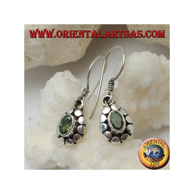 Silver earrings with natural oval peridot surrounded by discs
