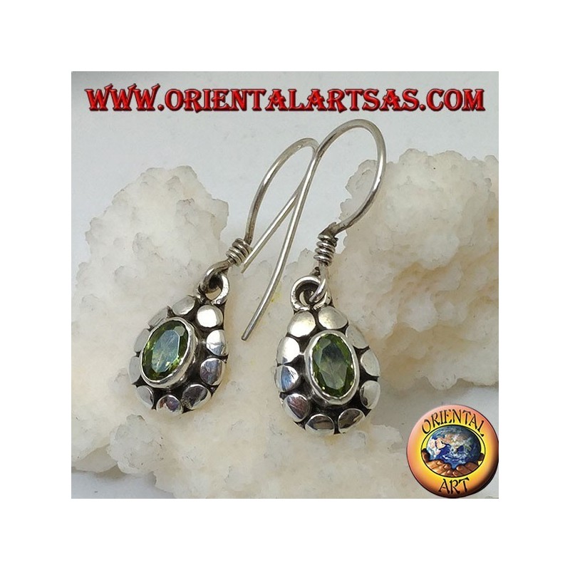 Silver earrings with natural oval peridot surrounded by discs