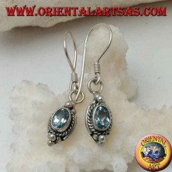 Silver earrings with natural oval blue topaz surrounded by intertwining and three balls above and below