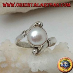 Silver ring with natural pearl in the center between helical arms