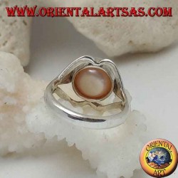 Silver ring with natural pearl in the center between lip lines