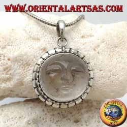 Silver pendant with sun hollowed out on a round rock crystal and diskette contour