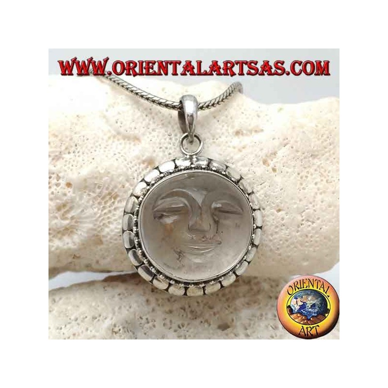 Silver pendant with sun hollowed out on a round rock crystal and diskette contour