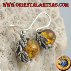 Silver earrings with natural amber sphere between the leaves