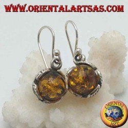 Silver earrings with natural amber sphere between the leaves