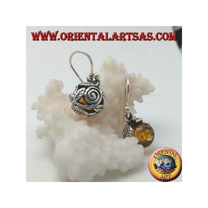 Silver earrings with natural amber sphere between the leaves