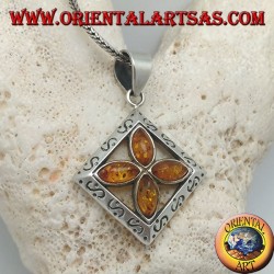 Silver cross pendant of 4 natural shuttle ambers in an engraved square