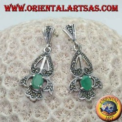Silver earrings with natural oval emerald set on an elegant openwork frame studded with marcasite