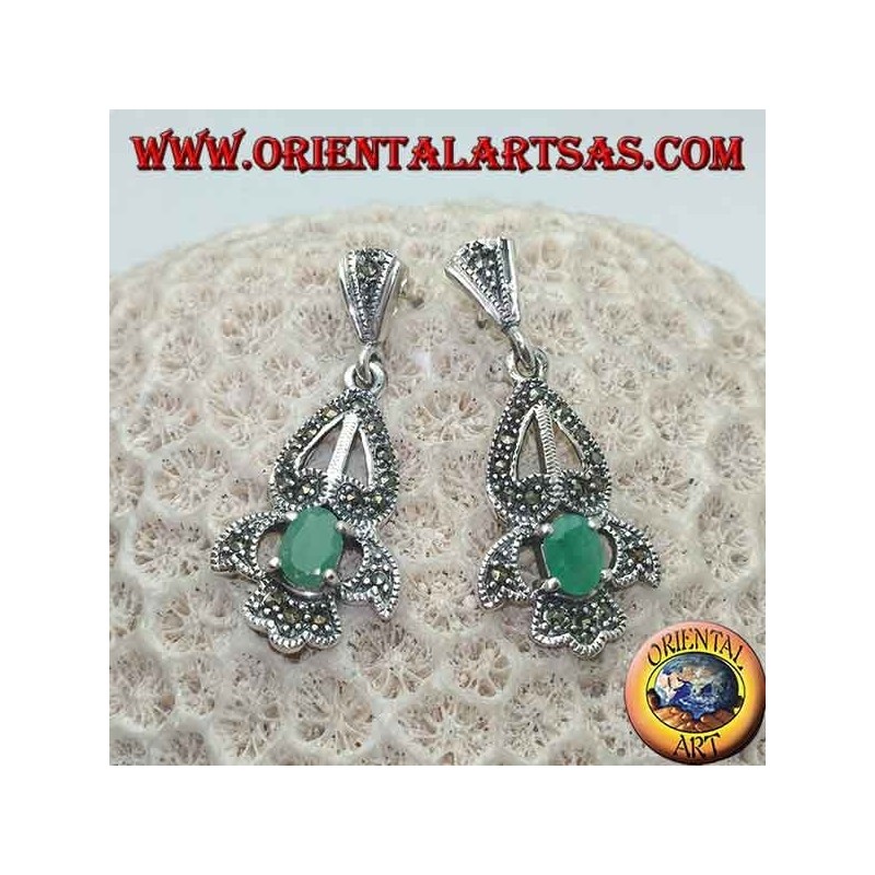 Silver earrings with natural oval emerald set on an elegant openwork frame studded with marcasite