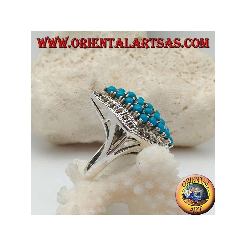 Rhomboid silver ring studded with turquoise balls set surrounded by a row of marcasite stones