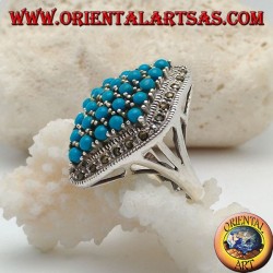 Rhomboid silver ring studded with turquoise balls set surrounded by a row of marcasite stones