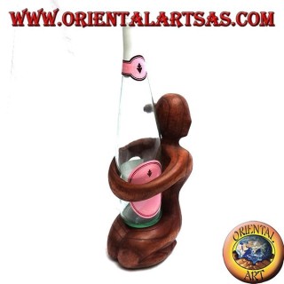 Bottle holder sculpture of a kneeling woman embracing in Suar wood
