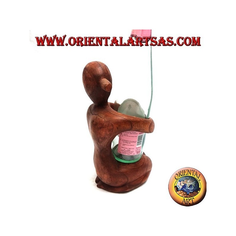 Bottle holder sculpture of a kneeling woman embracing in Suar wood