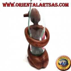 Porte-bouteille sculpture d'une femme agenouillée embrassant en bois de Suar