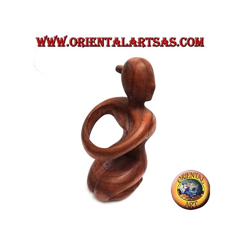 Porte-bouteille sculpture d'une femme agenouillée embrassant en bois de Suar