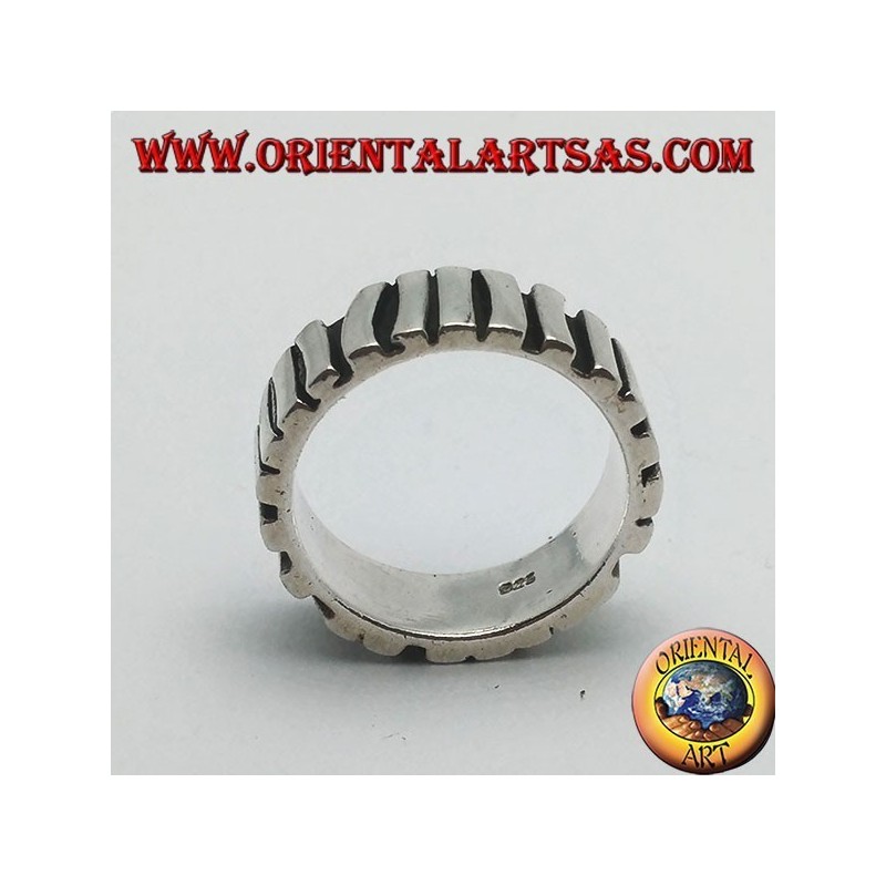 Silver band ring with a row of sticks placed parallel