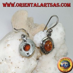 Silver earrings with oval natural amber surrounded by a disc with a ball on the cardinal points