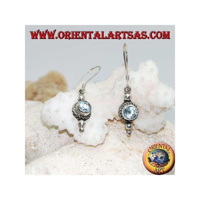 Round blue topaz silver earrings surrounded by interlacing and a small ball above and two below