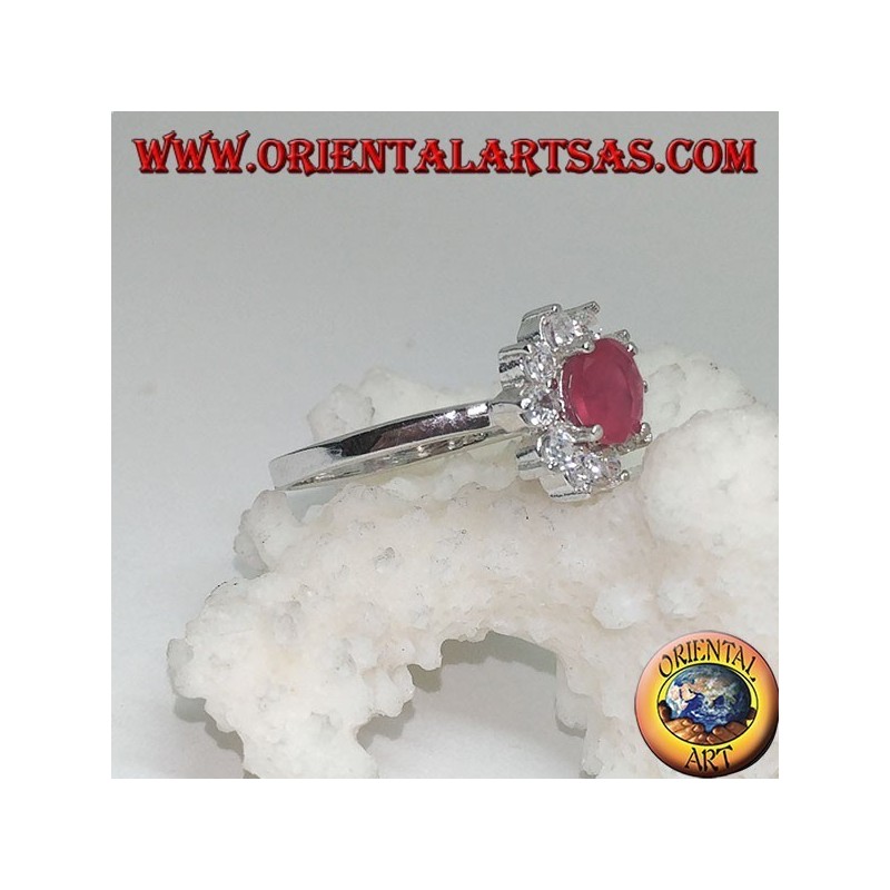 Silver flower ring with synthetic round ruby with embedded white zircon petals