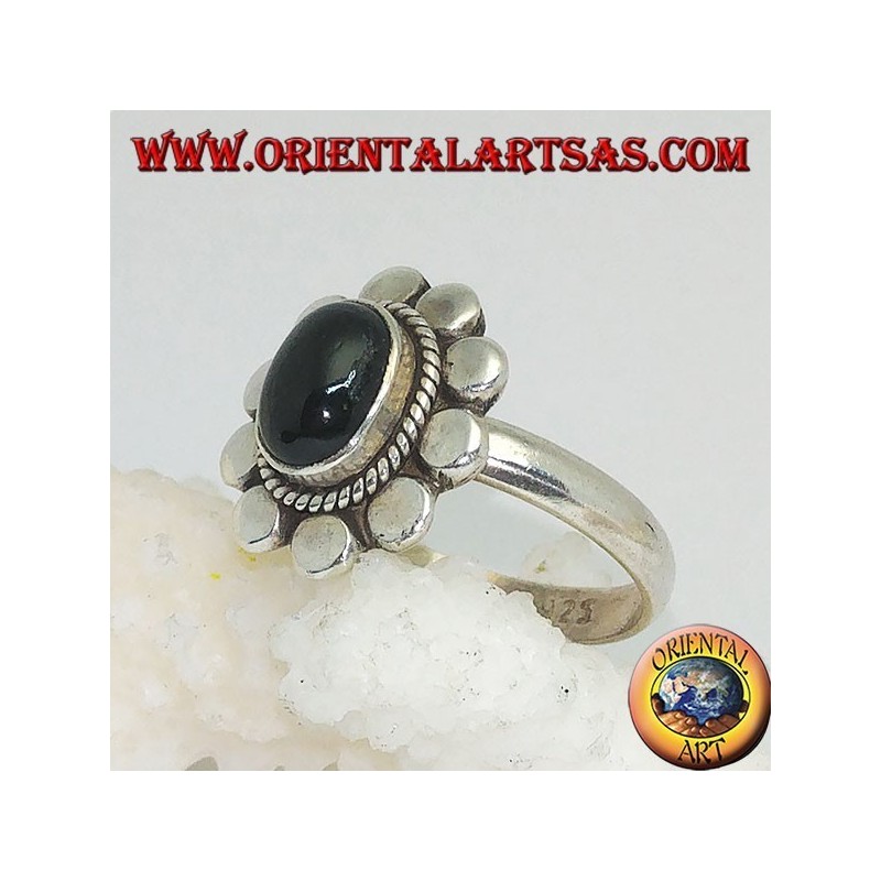 Anillo de flores de plata con cabujón oval estrella negra rodeada de trenzas y disquetes