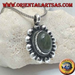 Silver flower pendant with oval cabochon labradorite surrounded by perforated discs