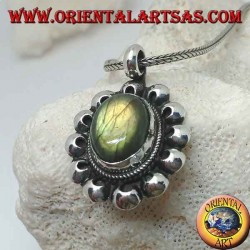 Silver flower pendant with oval cabochon labradorite surrounded by perforated discs