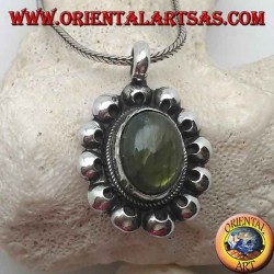 Silver flower pendant with oval cabochon labradorite surrounded by perforated discs