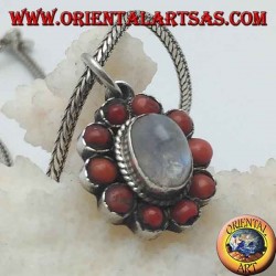 Silver flower pendant with rainbow moonstone cabochon and tibetan coral with petals