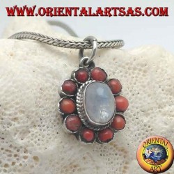 Silver flower pendant with rainbow moonstone cabochon and tibetan coral with petals