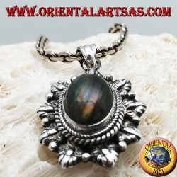 Silver pendant with oval cabochon labradorite surrounded by braid and leaf and alternating ball