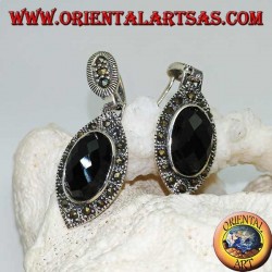 Silver earrings with oval faceted onyx surrounded by marcasite and lobe clasp