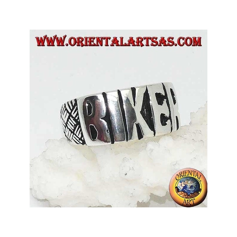 Silver ring with "BIKER" written in block letters and engravings on the sides