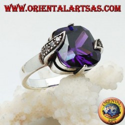 Silver ring with amethyst-colored square zircon set between marcasite leaves