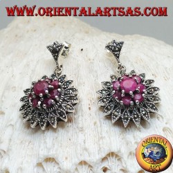 Silver earrings in the shape of a Dalia flower with round rubies set and marcasites