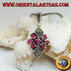 Silver pendant with a round ruby in a star of natural oval rubies and two marcasite rhombuses