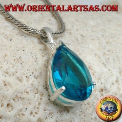 Silver pendant with a faceted blue topaz set