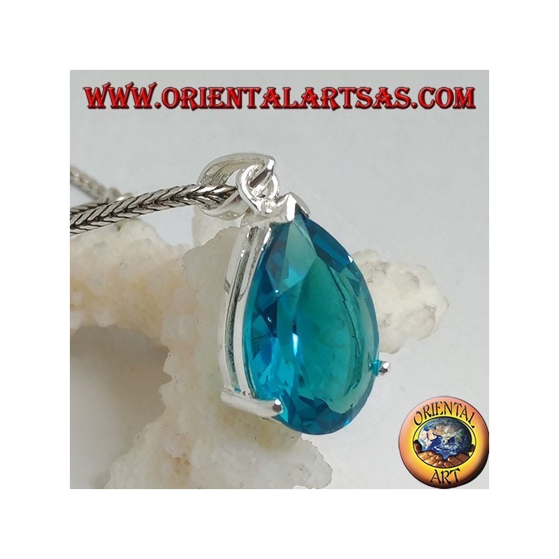 Silver pendant with a faceted blue topaz set