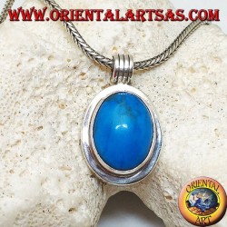 Pendentif en argent avec cabochon turquoise ovale sur un cadre lisse épais et un crochet rayé