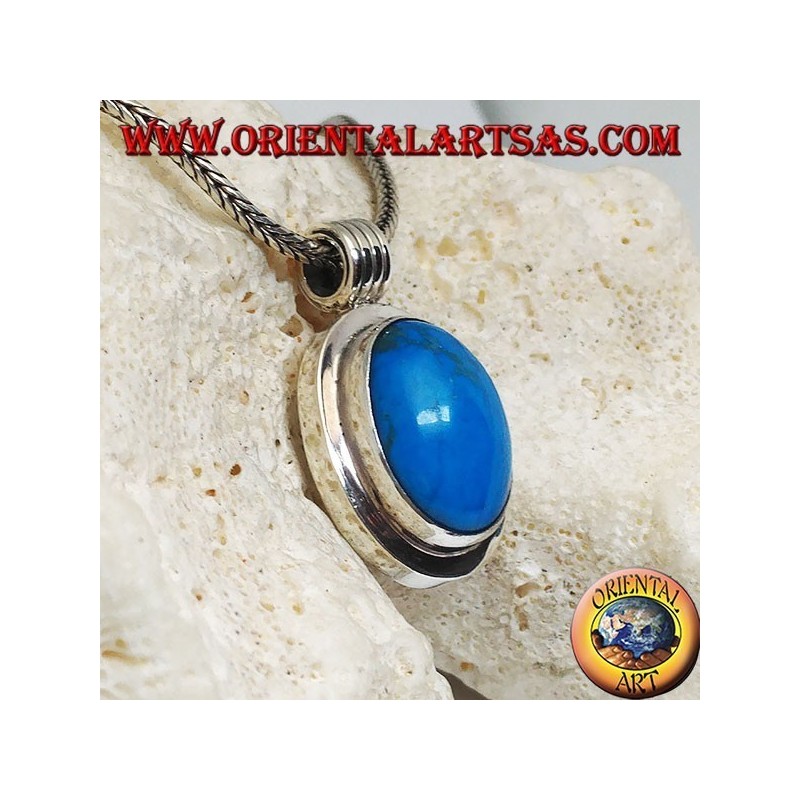 Silver pendant with oval turquoise cabochon on a thick smooth frame and a striped hook