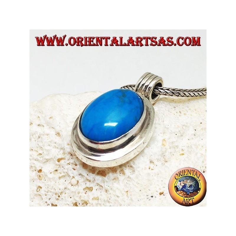 Pendentif en argent avec cabochon turquoise ovale sur un cadre lisse épais et un crochet rayé