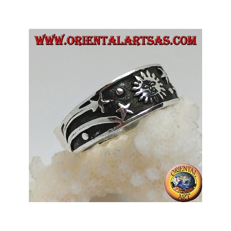 Ring in silver with sun and comet stars in bas-relief